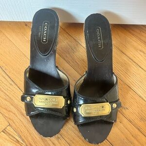 Coach Black Leather Slide Mules with Gold Plaque
